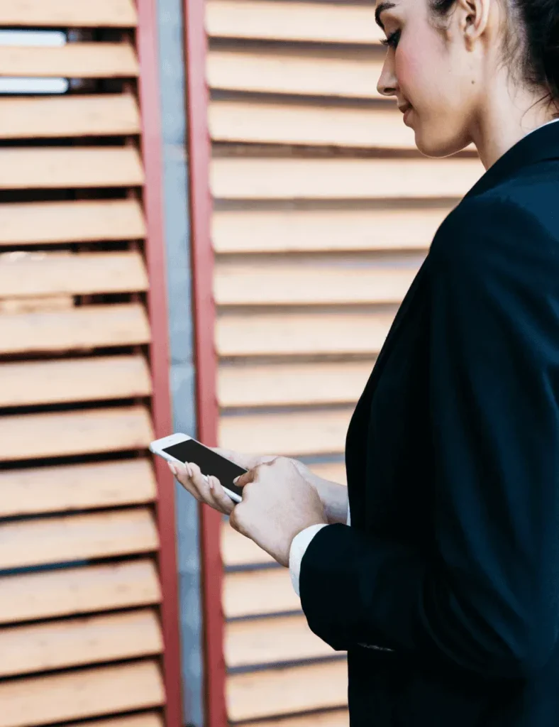 person on phone scheduling blinds and shutters appointment- thank you